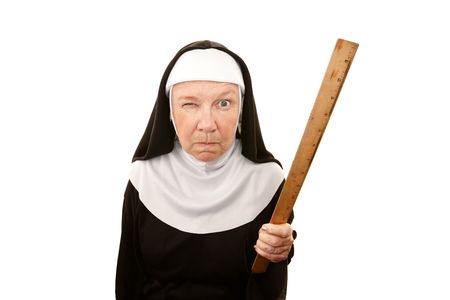 6402745 - funny nun carrying wooden ruler as a weapon